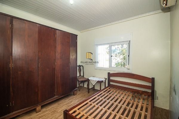 Casa em Porto Alegre, no bairro Vila Nova, com 6 dormitório(s), e 6 banheiros, à