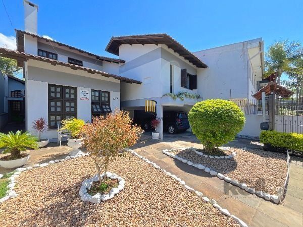 Casa 4 dormitórios à venda Camaquã Porto Alegre/RS