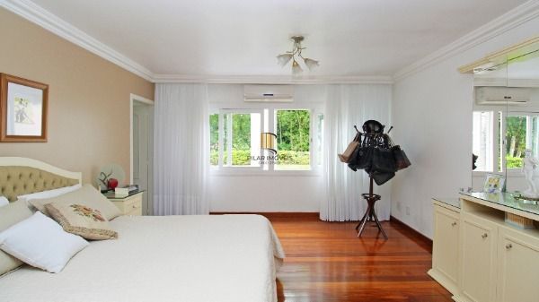 Casa Condominio em Porto Alegre, no bairro Cascata, com 3 dormitório(s), e 3 ban