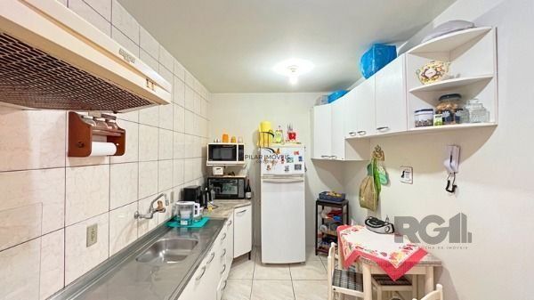 Casa Condominio em Porto Alegre, no bairro Tristeza, com 3 dormitório(s), e 3 ba