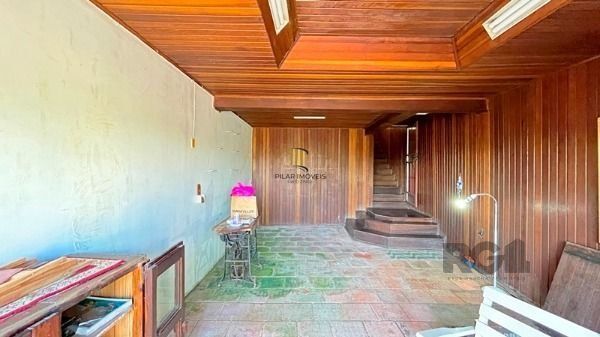 Casa em Porto Alegre, no bairro Tristeza, com 4 dormitório(s), à venda.