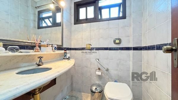 Casa 4 dormitórios à venda Camaquã Porto Alegre/RS