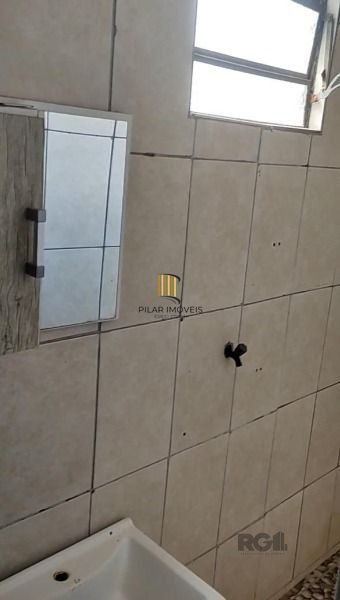 Casa em Porto Alegre, no bairro Vila Nova, com 3 dormitório(s), e 3 banheiros, à