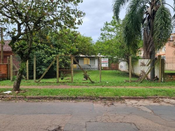 Casa em Porto Alegre, no bairro Guarujá, à venda. - Pilar Imóveis