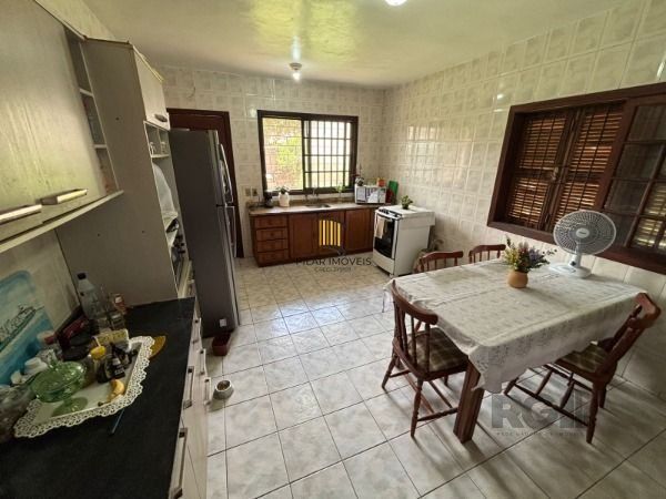 Casa térrea de 3D no miolo do Bairro Tristeza.