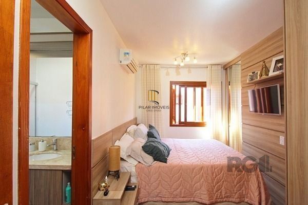 Casa Condominio em Porto Alegre, no bairro Tristeza, com 3 dormitório(s), e 3 ba