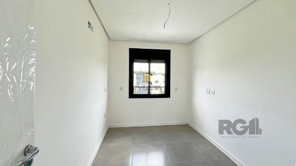 Casa Condominio em Porto Alegre, no bairro Campo Novo, com 3 dormitório(s), e 3 