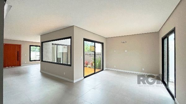 Casa Condominio em Porto Alegre, no bairro Hípica, com 3 dormitório(s), e 3 banh
