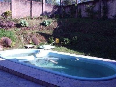 Casa em Porto Alegre, no bairro Jardim Isabel, com 4 dormitório(s), à venda.