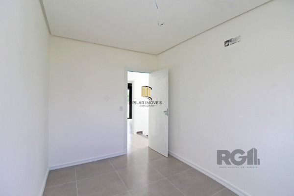 Casa Condominio em Porto Alegre, no bairro Campo Novo, com 3 dormitório(s), e 3 