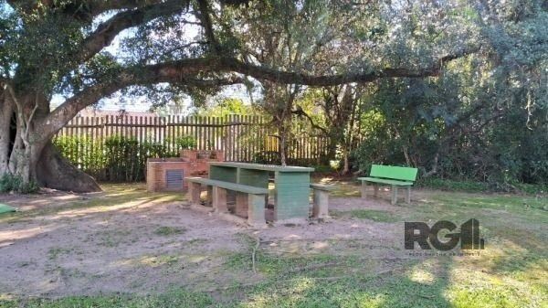 Casa Condominio em Porto Alegre, no bairro Cavalhada, com 4 dormitório(s), e 4 b