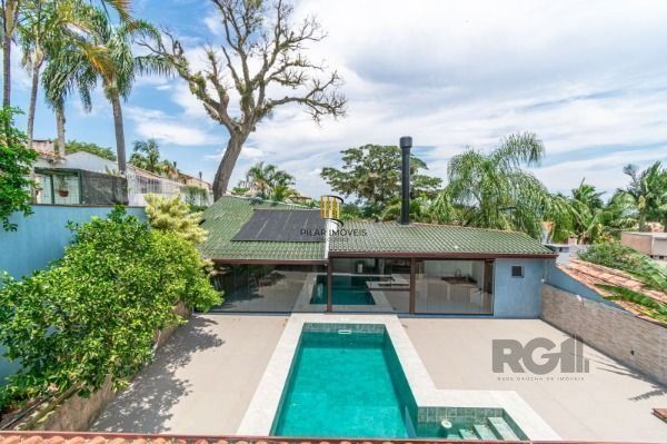 Residência com 4 dormitórios á venda no Bairro Jardim Izabel.