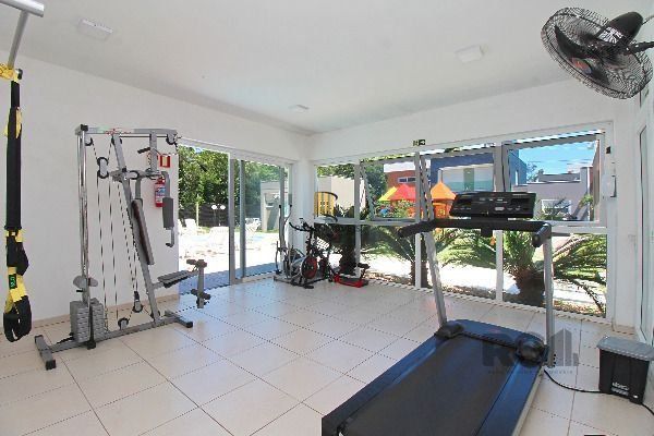 Casa em condomínio 4 D, sendo um dormitório no térreo , 168 m² , garagem coberta