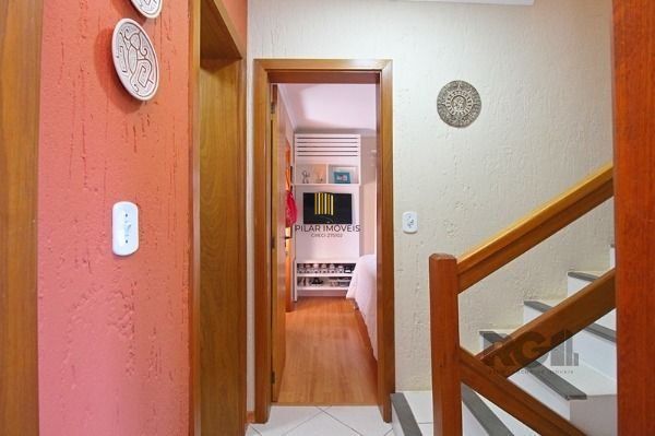 Casa Condominio em Porto Alegre, no bairro Guarujá, com 2 dormitório(s), e 2 ban