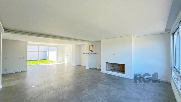 Casa Condominio em Porto Alegre, no bairro Hípica, com 3 dormitório(s), e 3 banh