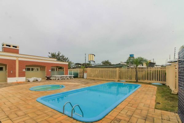 Carrara- Casa térrea 2 dormitórios, reformada , com 2 vagas , churrasqueira