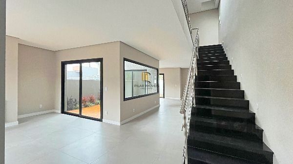 Casa Condominio em Porto Alegre, no bairro Hípica, com 3 dormitório(s), e 3 banh