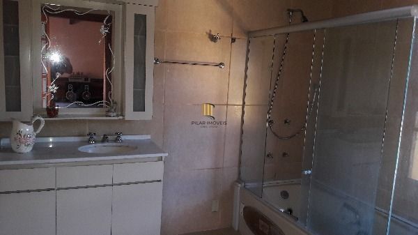 Casa em Porto Alegre, no bairro Aberta dos Morros, com 4 dormitório(s), e 4 banh