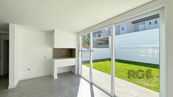 Casa Condominio em Porto Alegre, no bairro Hípica, com 3 dormitório(s), e 3 banh