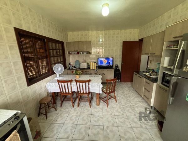Casa térrea de 3D no miolo do Bairro Tristeza.