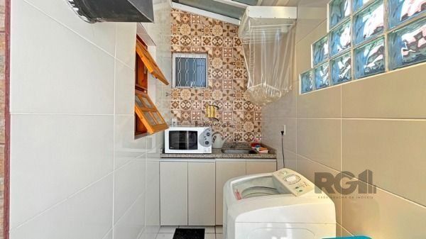 Casa Condominio em Porto Alegre, no bairro Tristeza, com 3 dormitório(s), e 3 ba