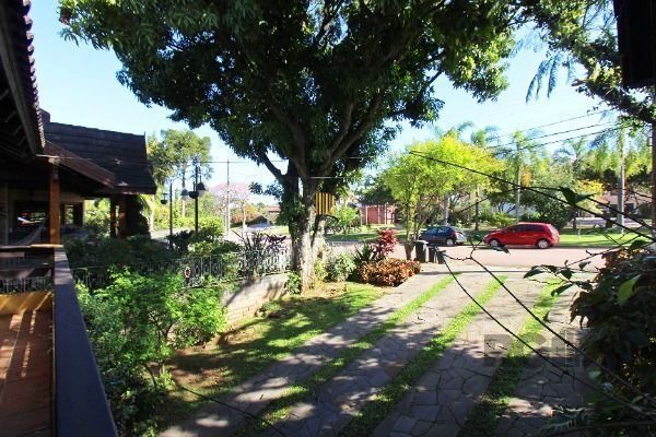 Casa Condominio em Porto Alegre, no bairro Cavalhada, com 4 dormitório(s), e 4 b