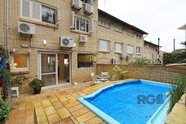 Casa Condominio em Porto Alegre, no bairro Sétimo Céu, com 4 dormitório(s), e 4 