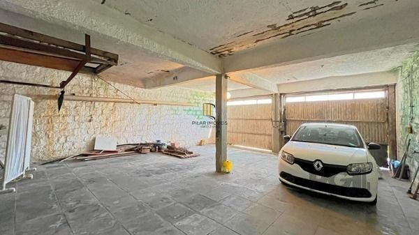 Casa em Porto Alegre, no bairro Tristeza, com 4 dormitório(s), à venda.