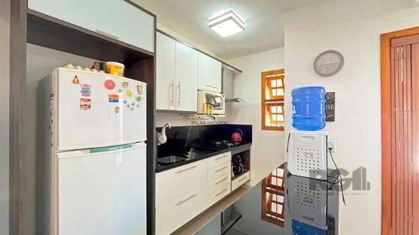 Casa Condominio em Porto Alegre, no bairro Tristeza, com 3 dormitório(s), e 3 ba