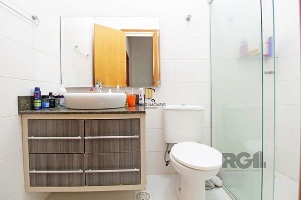 Casa Condomínio em Porto Alegre, no bairro Tristeza, com 3 dormitório(s), à vend