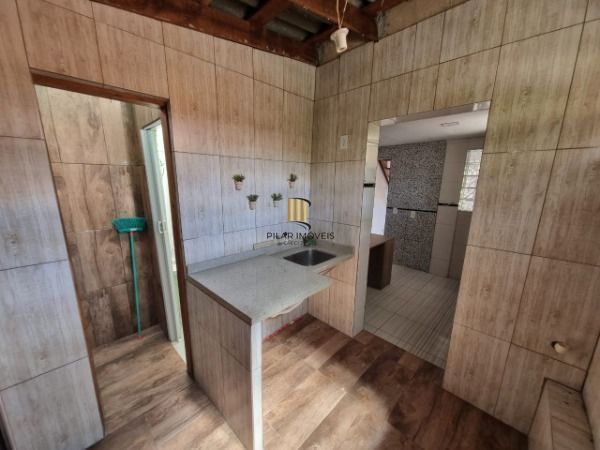 Sobrado em Porto Alegre, no bairro Vila Nova, com 2 dormitório(s), e 2 banheiros