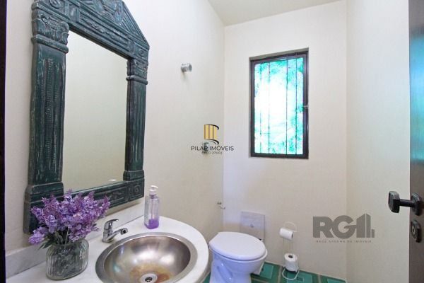 Casa Condominio em Porto Alegre, no bairro Cavalhada, com 4 dormitório(s), e 4 b