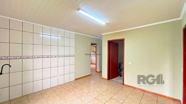 Casa em Porto Alegre, no bairro Vila Nova, com 2 dormitório(s), à venda.