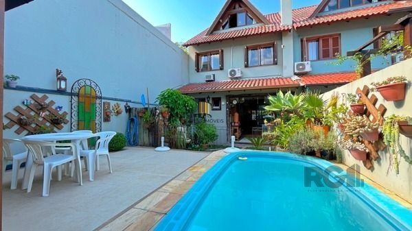 Casa em Porto Alegre, no bairro Ipanema, com 3 dormitório(s), e 3 banheiros, à v