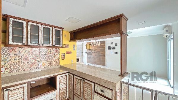 Casa Condominio em Porto Alegre, no bairro Hípica, com 3 dormitório(s), e 3 banh