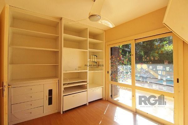 Casa Condominio em Porto Alegre, no bairro Cavalhada, com 4 dormitório(s), e 4 b