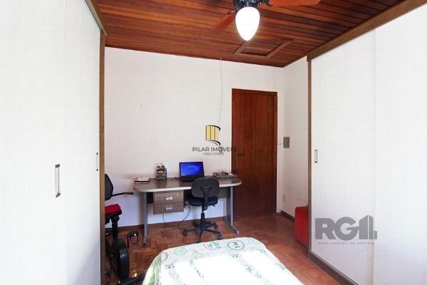 Sobrado em Porto Alegre, no bairro Vila Nova, com 3 dormitório(s), e 3 banheiros