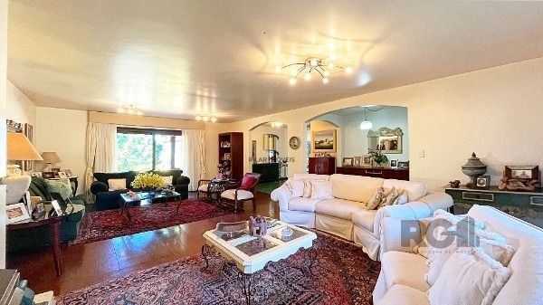 Casa Condominio em Porto Alegre, no bairro Cavalhada, com 4 dormitório(s), e 4 b