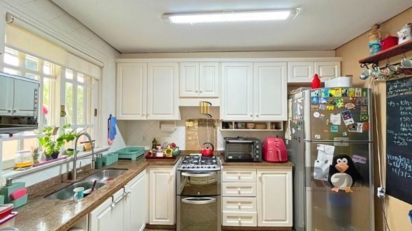 Casa Condominio em Porto Alegre, no bairro Jardim Isabel, com 3 dormitório(s), à