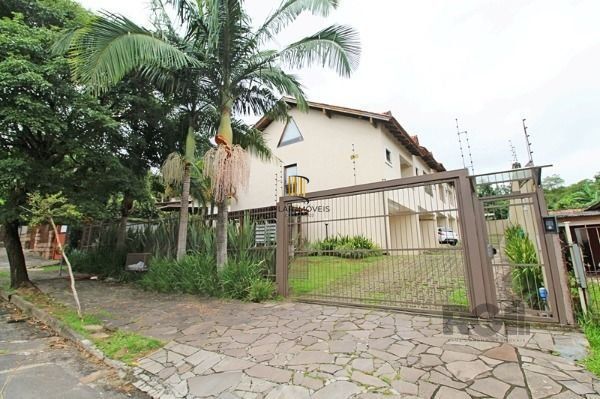 Casa Condomínio em Porto Alegre, no bairro Tristeza, com 3 dormitório(s), à vend