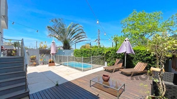 Casa em Porto Alegre, no bairro Aberta dos Morros, com 3 dormitório(s), e 3 banh