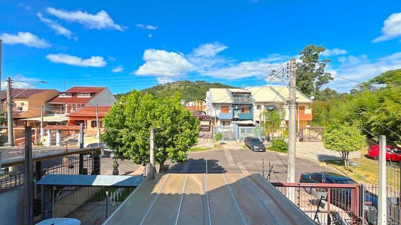 Casa 2 dormitórios à venda Guarujá Porto Alegre/RS