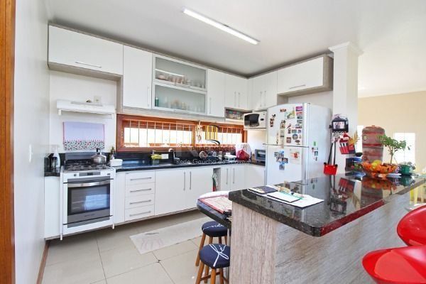 Casa Condominio em Porto Alegre, no bairro Glória, com 3 dormitório(s), e 3 banh