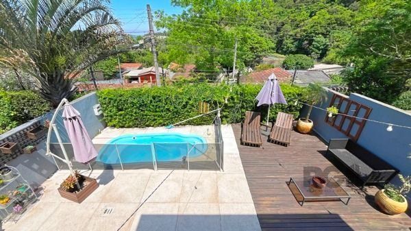 Casa em Porto Alegre, no bairro Aberta dos Morros, com 3 dormitório(s), e 3 banh