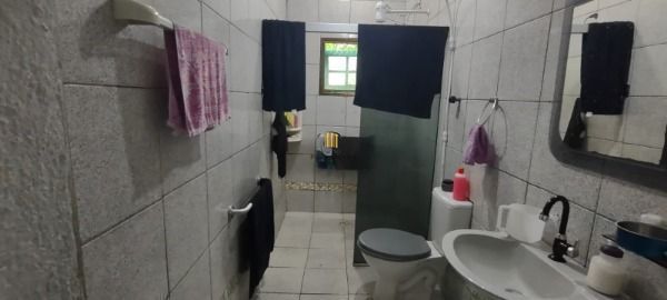 Casa em Porto Alegre, no bairro Espírito Santo, com 3 dormitório(s), e 3 banheir