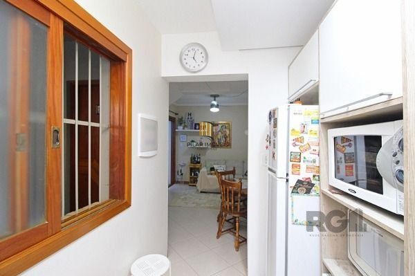 Casa Condominio em Porto Alegre, no bairro Guarujá, com 2 dormitório(s), e 2 ban