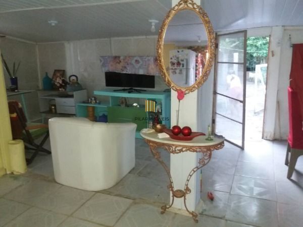 Casa em Viamão, no bairro Itapuã, com 3 dormitório(s), e 3 banheiros, à venda.