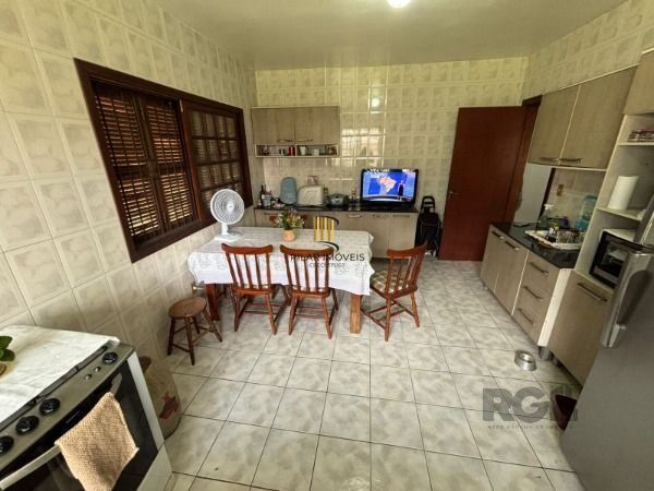 Casa térrea de 3D no miolo do Bairro Tristeza.