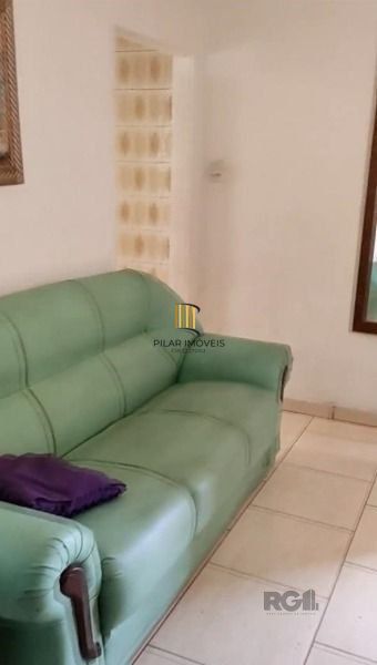 Casa em Porto Alegre, no bairro Vila Nova, com 3 dormitório(s), e 3 banheiros, à