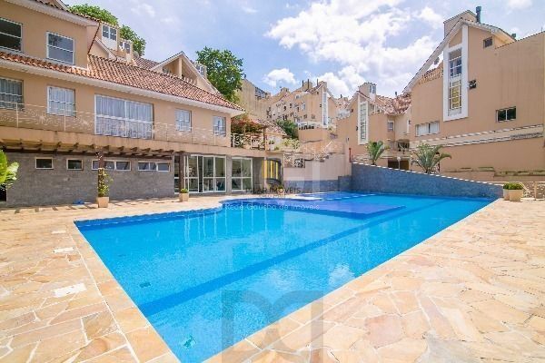 Casa de Condomínio 3 dormitórios no bairro Pedra Redonda